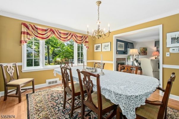 Chandelier, Dining room, Fireplace, Interior, Wood Texture Flooring
