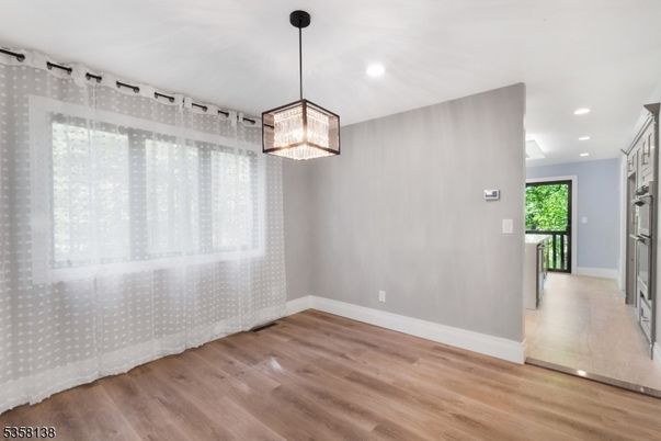 Empty room, Interior, Pendant Lights, Recessed Lighting, Wood Texture Flooring
