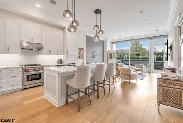 Dining room, Interior, Kitchen, Living room, Pendant Lights, Recessed Lighting, Stainless Steel Appliances, Wood Texture Flooring