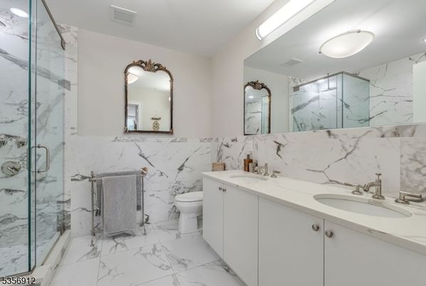 Bathroom, Dual Sink Vanities, Glass Shower, Interior, Marble, Marble Walls