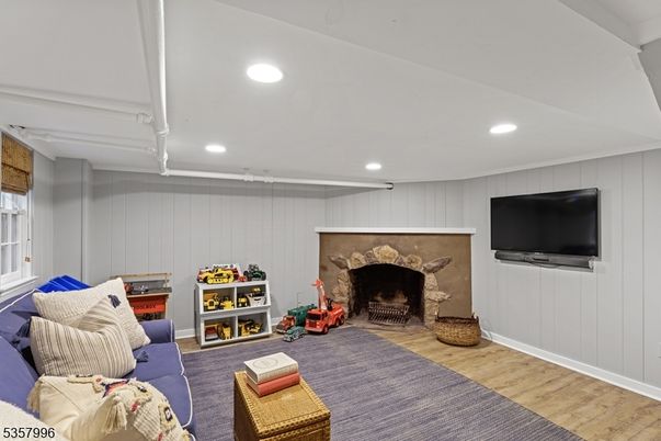 Fireplace, Interior, Living room, Recessed Lighting, Wood Texture Flooring