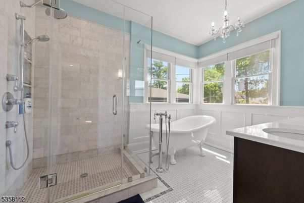 Bathroom, Chandelier, Free Standing Baths, Glass Shower, Interior, Marble Walls
