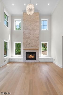 Chandelier, Fireplace, Interior, Recessed Lighting, Wood Texture Flooring