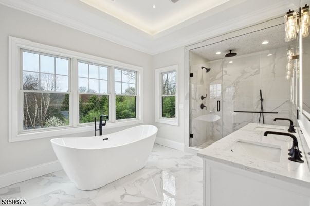Bathroom, Dual Sink Vanities, Free Standing Baths, Glass Shower, Interior, Marble, Marble Walls, Recessed Lighting