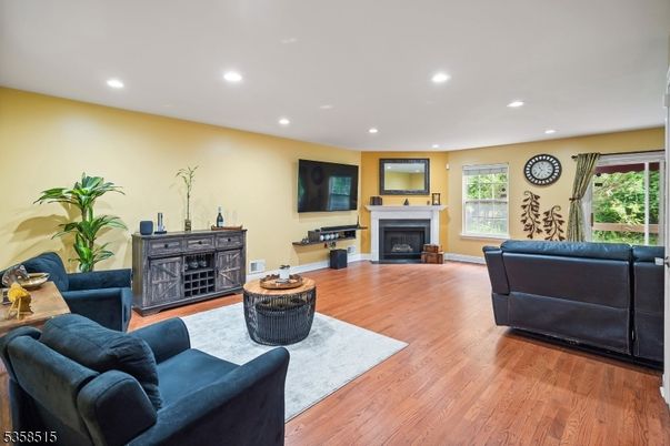 Fireplace, Interior, Living room, Recessed Lighting, Wood Texture Flooring