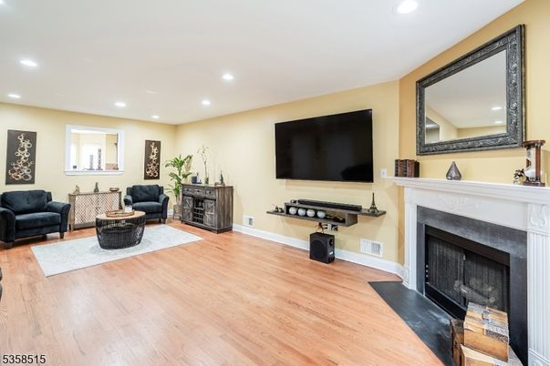 Fireplace, Interior, Living room, Recessed Lighting, Wood Texture Flooring