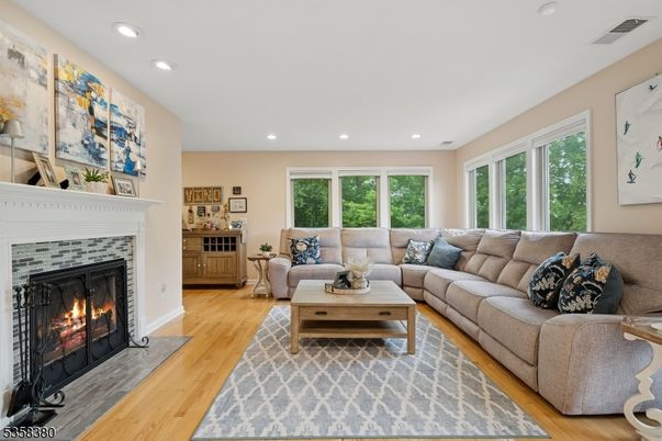 Fireplace, Interior, Living room, Recessed Lighting, Wood Texture Flooring