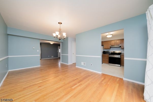 Chandelier, Empty room, Interior, Kitchen, Stainless Steel Appliances, Wood Texture Flooring