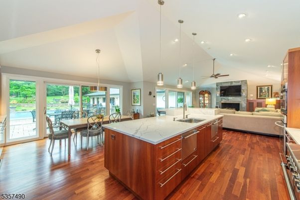 Dining room, Fireplace, Interior, Kitchen, Living room, Pendant Lights, Recessed Lighting, Wood Texture Flooring