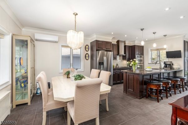 Chandelier, Dining room, Interior, Kitchen, Pendant Lights, Recessed Lighting, Stainless Steel Appliances