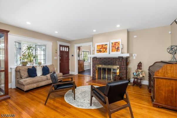 Fireplace, Interior, Living room, Recessed Lighting, Wood Texture Flooring
