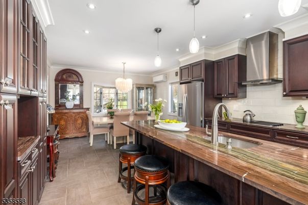 Chandelier, Dining room, Interior, Kitchen, Pendant Lights, Recessed Lighting, Stainless Steel Appliances