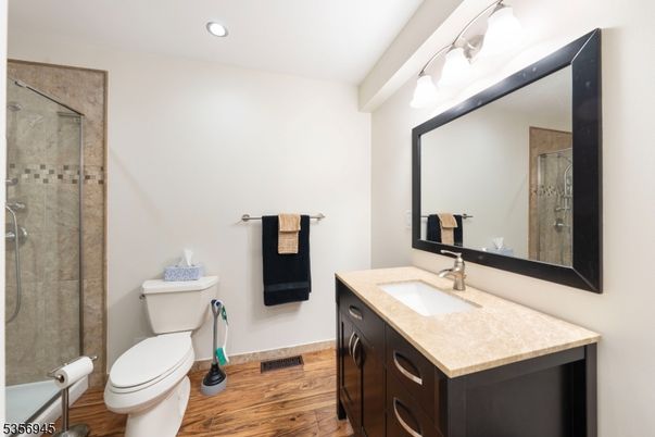 Bathroom, Glass Shower, Interior, Recessed Lighting, Wood Texture Flooring