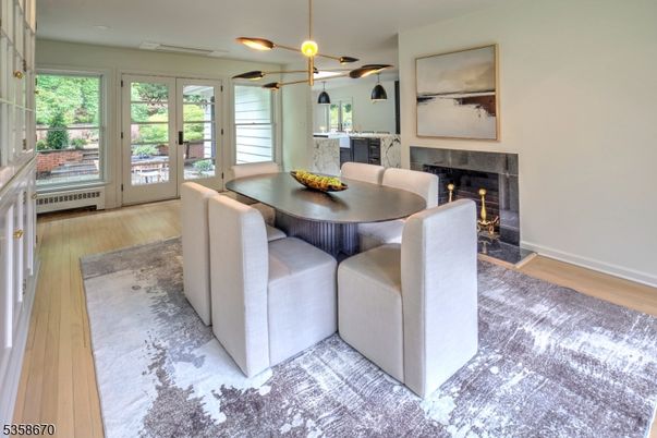 Dining room, Fireplace, Interior, Pendant Lights, Wood Texture Flooring