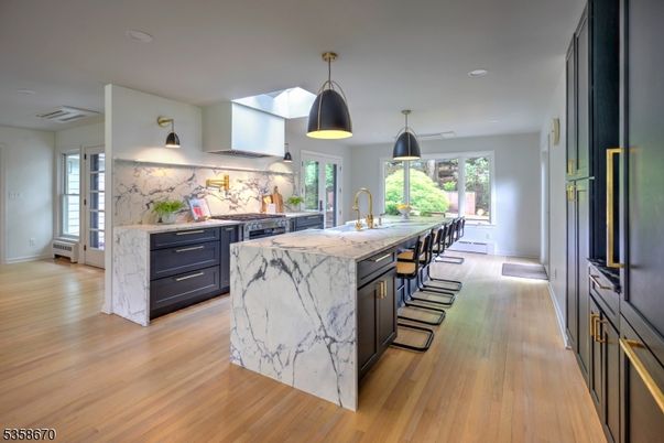 Interior, Kitchen, Marble Walls, Pendant Lights, Recessed Lighting, Wood Texture Flooring