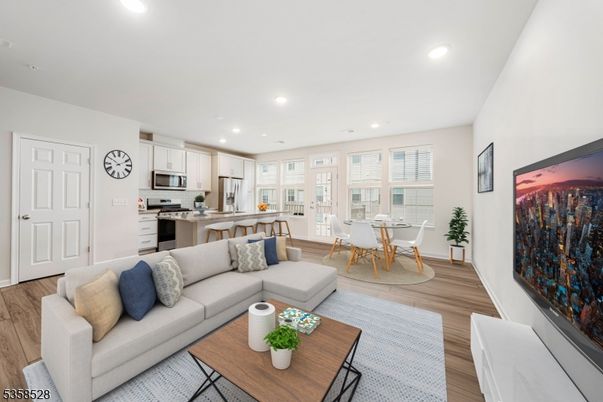 Dining room, Interior, Kitchen, Living room, Recessed Lighting, Stainless Steel Appliances, Wood Texture Flooring
