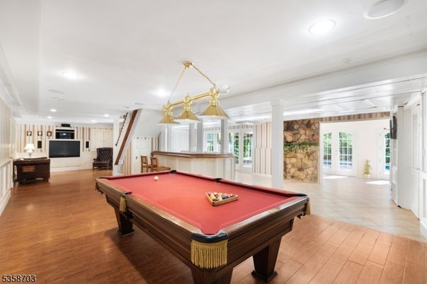 Billiard Table, Game Room, Interior, Pendant Lights, Recessed Lighting, Stone Walls, Wood Texture Flooring