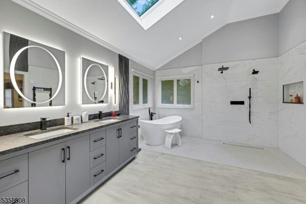 Bathroom, Dual Sink Vanities, Free Standing Baths, Interior, Marble, Marble Walls, Recessed Lighting