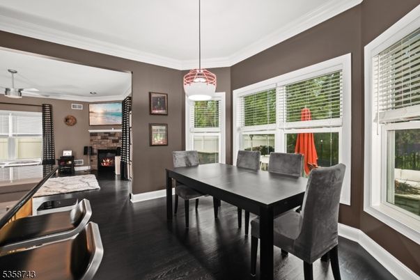 Dining room, Fireplace, Interior, Pendant Lights, Wood Texture Flooring