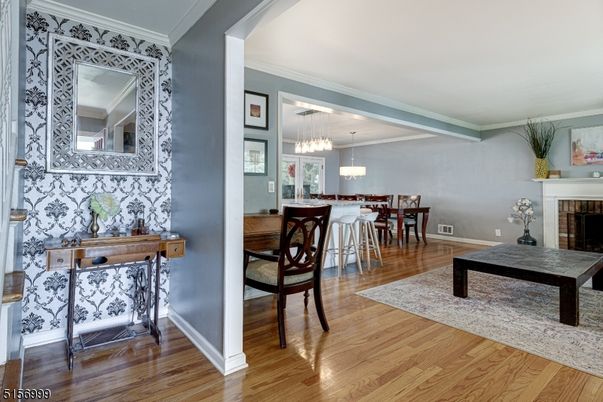 Chandelier, Dining room, Fireplace, Interior, Pendant Lights, Wood Texture Flooring