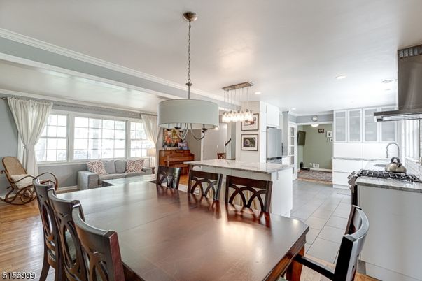 Chandelier, Dining room, Interior, Kitchen, Living room, Pendant Lights, Recessed Lighting, Wood Texture Flooring