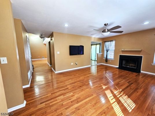 Empty room, Fireplace, Interior, Recessed Lighting, Wood Texture Flooring