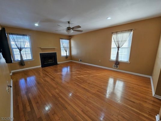 Empty room, Fireplace, Interior, Recessed Lighting, Wood Texture Flooring