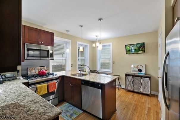 Interior, Kitchen, Pendant Lights, Stainless Steel Appliances, Wood Texture Flooring