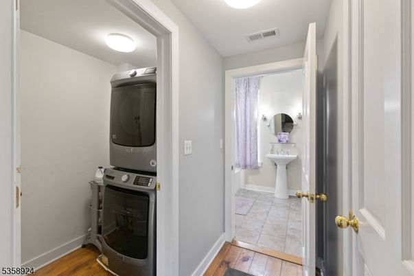 Bathroom, Interior, Utility Closets, Washer, Wood Texture Flooring