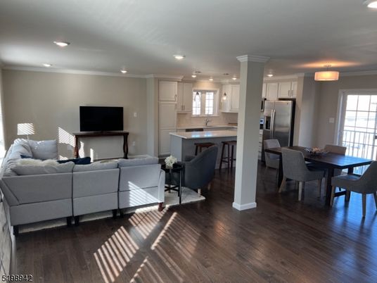 Dining room, Interior, Kitchen, Living room, Recessed Lighting, Stainless Steel Appliances, Wood Texture Flooring