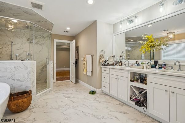 Bathroom, Dual Sink Vanities, Glass Shower, Interior, Marble, Marble Walls, Recessed Lighting