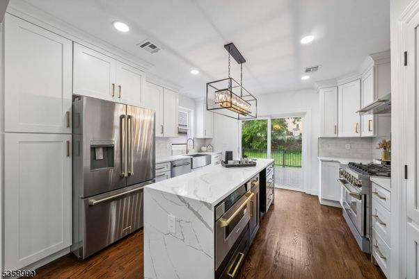 Interior, Kitchen, Pendant Lights, Recessed Lighting, Stainless Steel Appliances, Wood Texture Flooring