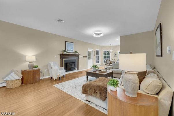 Chandelier, Fireplace, Interior, Living room, Pendant Lights, Recessed Lighting, Wood Texture Flooring