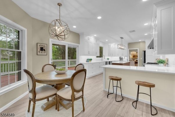 Chandelier, Dining room, Interior, Kitchen, Pendant Lights, Recessed Lighting, Wood Texture Flooring