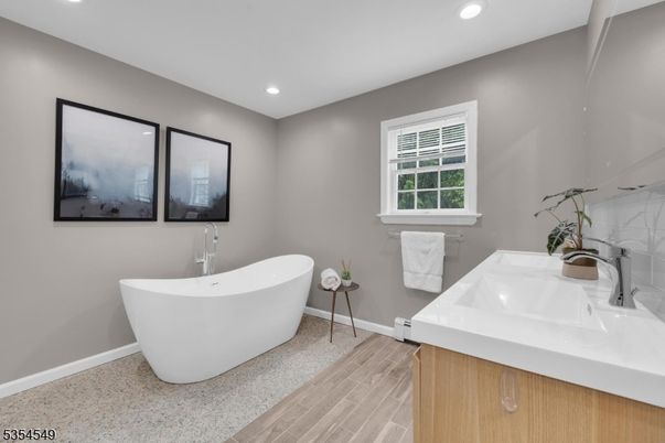 Bathroom, Dual Sink Vanities, Free Standing Baths, Interior, Recessed Lighting, Wood Texture Flooring