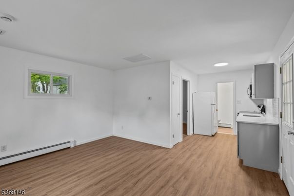 Empty room, Interior, Kitchen, Recessed Lighting, Wood Texture Flooring