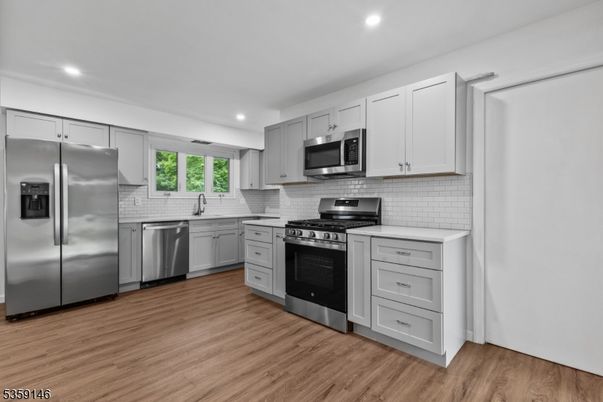 Interior, Kitchen, Recessed Lighting, Stainless Steel Appliances, Wood Texture Flooring