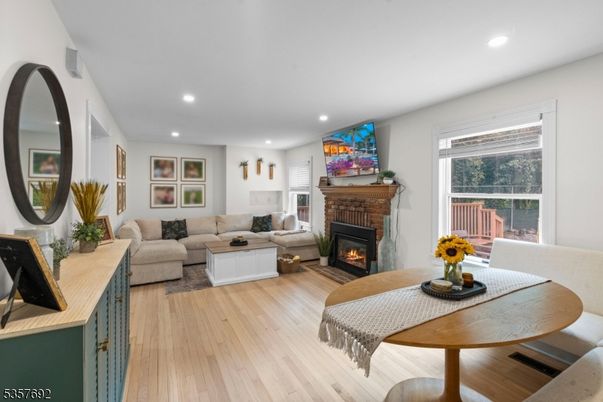 Fireplace, Interior, Living room, Recessed Lighting, Wood Texture Flooring