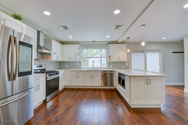 Interior, Kitchen, Pendant Lights, Recessed Lighting, Stainless Steel Appliances, Wood Texture Flooring