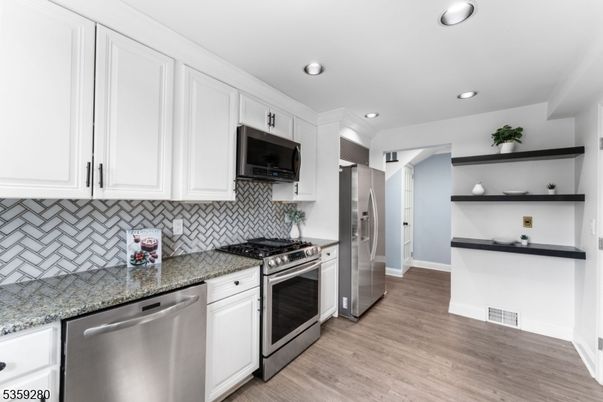Interior, Kitchen, Recessed Lighting, Stainless Steel Appliances, Wood Texture Flooring