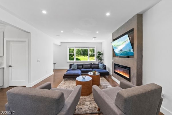 Fireplace, Interior, Living room, Recessed Lighting, Wood Texture Flooring