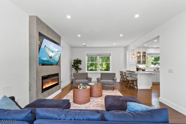 Dining room, Fireplace, Interior, Kitchen, Living room, Pendant Lights, Recessed Lighting, Wood Texture Flooring