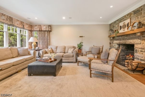 Fireplace, Interior, Living room, Recessed Lighting, Stone Walls, Wood Texture Flooring