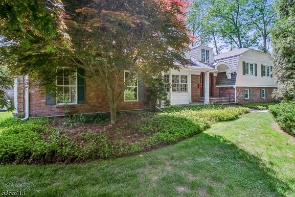 Backyard, Exterior, Facade, Brick Facade, Raised Ranch