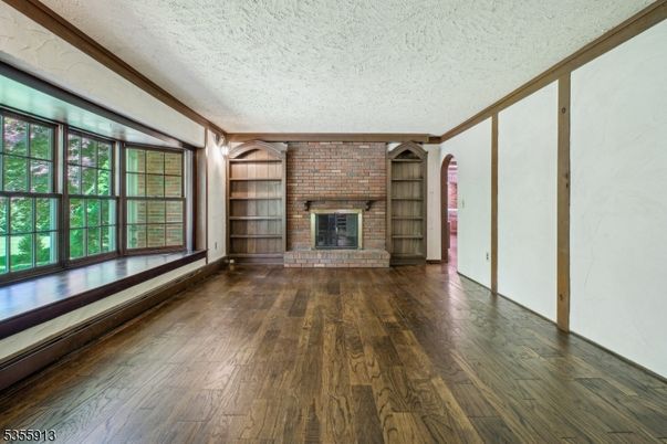 Empty room, Fireplace, Interior, Stone Walls, Wood Texture Flooring