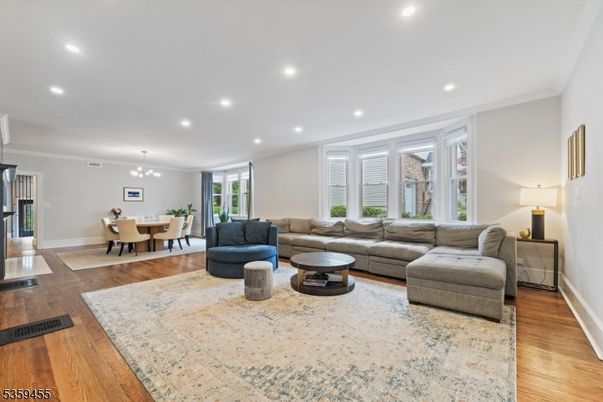 Chandelier, Dining room, Interior, Living room, Recessed Lighting, Wood Texture Flooring