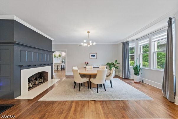 Dining room, Fireplace, Interior, Pendant Lights, Wood Texture Flooring