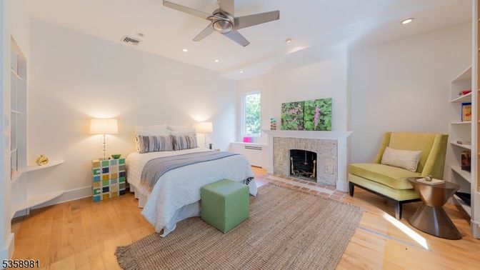 Bedroom, Fireplace, Interior, Recessed Lighting, Wood Texture Flooring