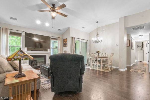 Chandelier, Dining room, Fireplace, Interior, Living room, Recessed Lighting, Wood Texture Flooring