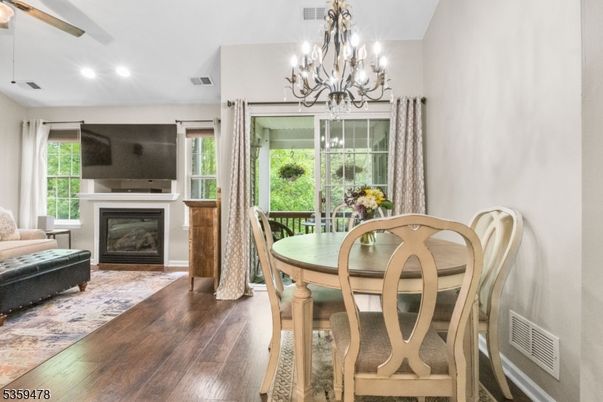 Chandelier, Dining room, Fireplace, Interior, Recessed Lighting, Wood Texture Flooring